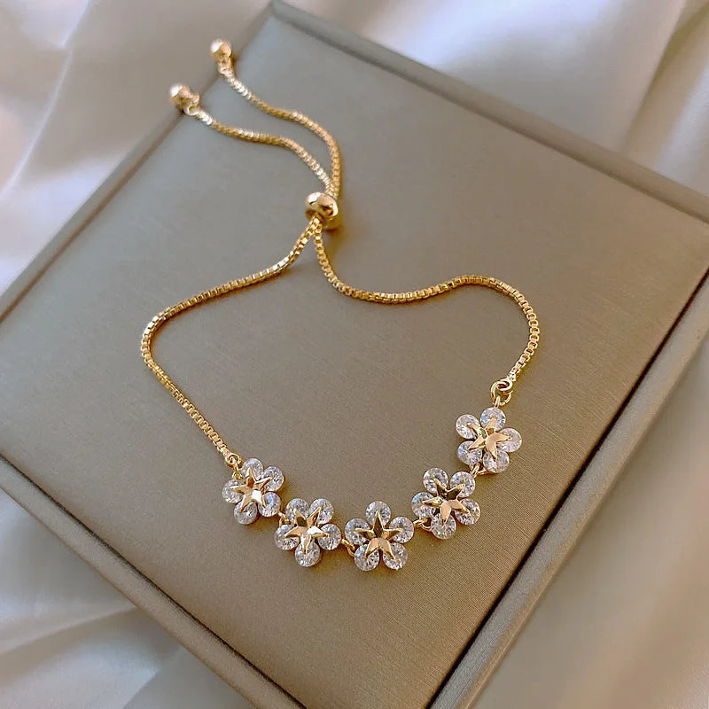 Gold Rhinestone Star & Flower Charm Bracelet – Adjustable Bangle