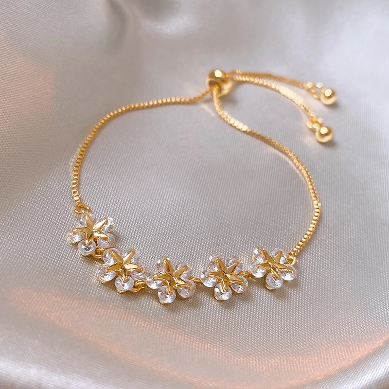 Gold Rhinestone Star & Flower Charm Bracelet – Adjustable Bangle