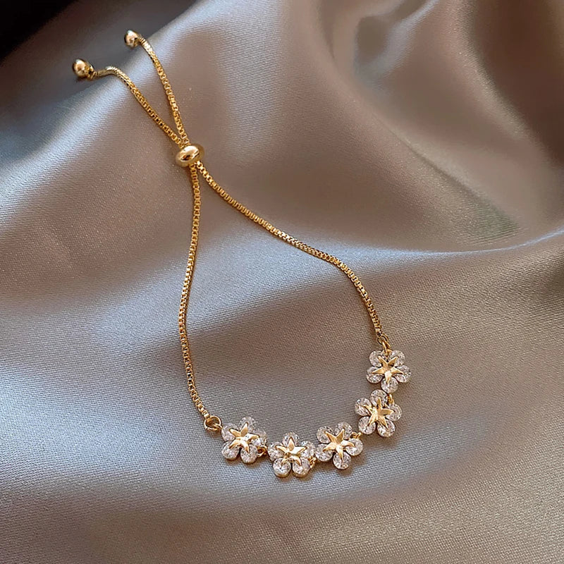 Gold Rhinestone Star & Flower Charm Bracelet – Adjustable Bangle