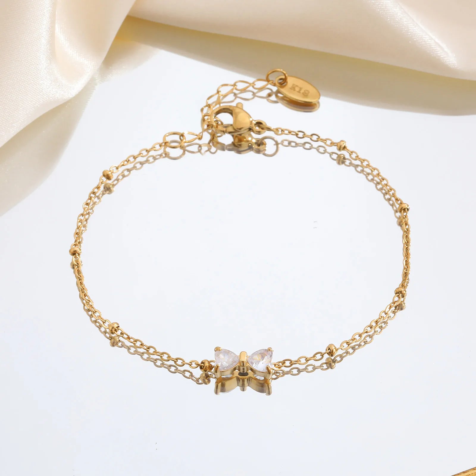 Gold Zircon Bow Bracelet – Trendy Waterproof Bead Chain for Women