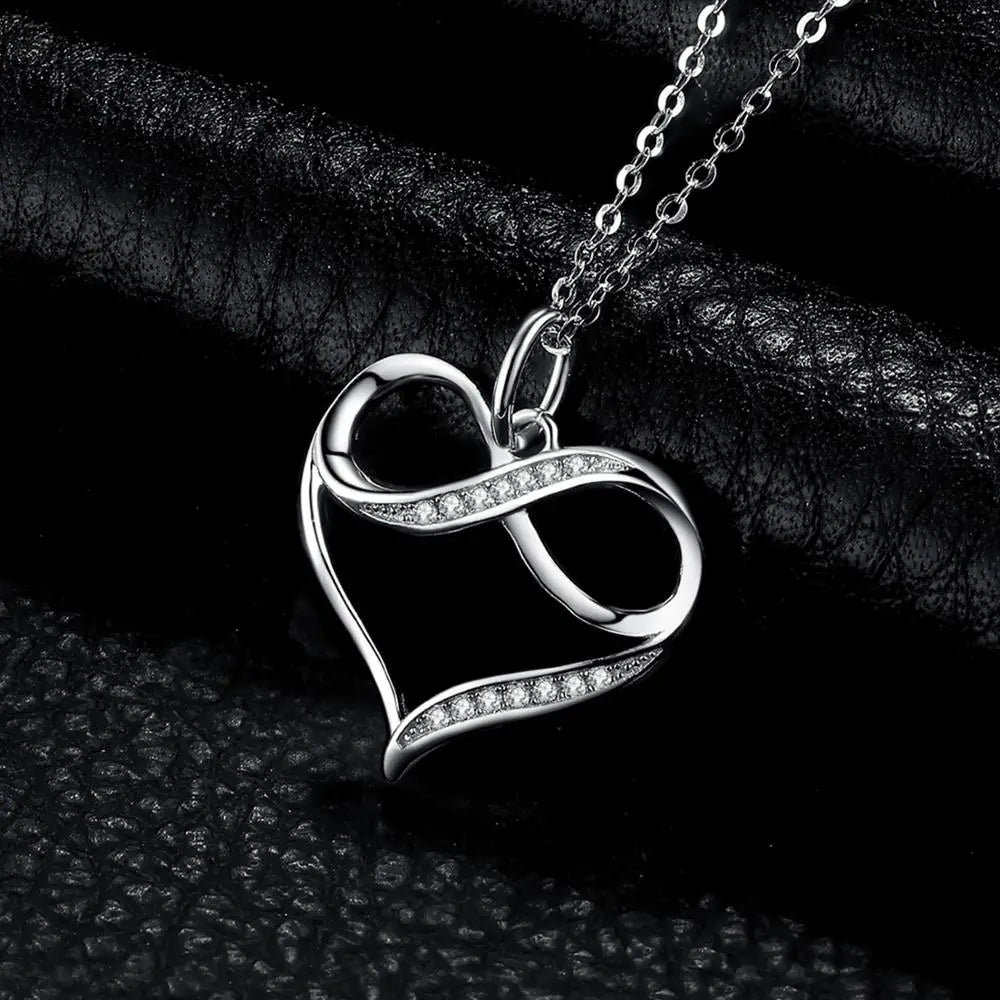 Sterling Silver Infinity Heart Knot Pendant with Simulated Diamonds