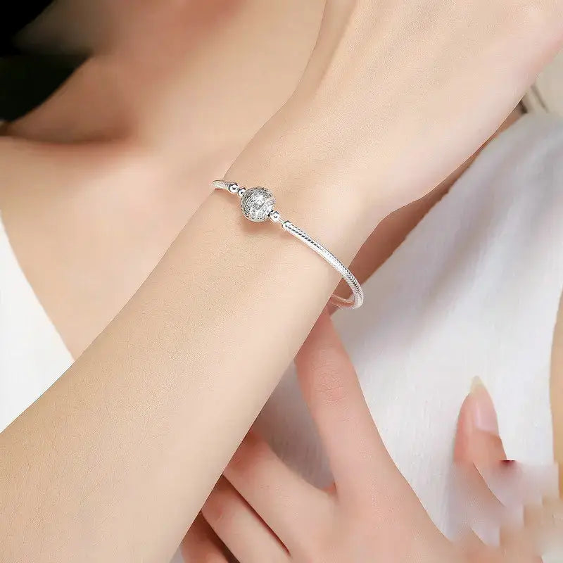 Sterling Silver CZ Flower Clasp Snake Chain Bracelet
