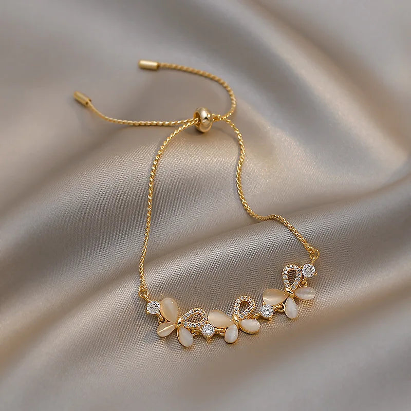 Gold Rhinestone Star & Flower Charm Bracelet – Adjustable Bangle