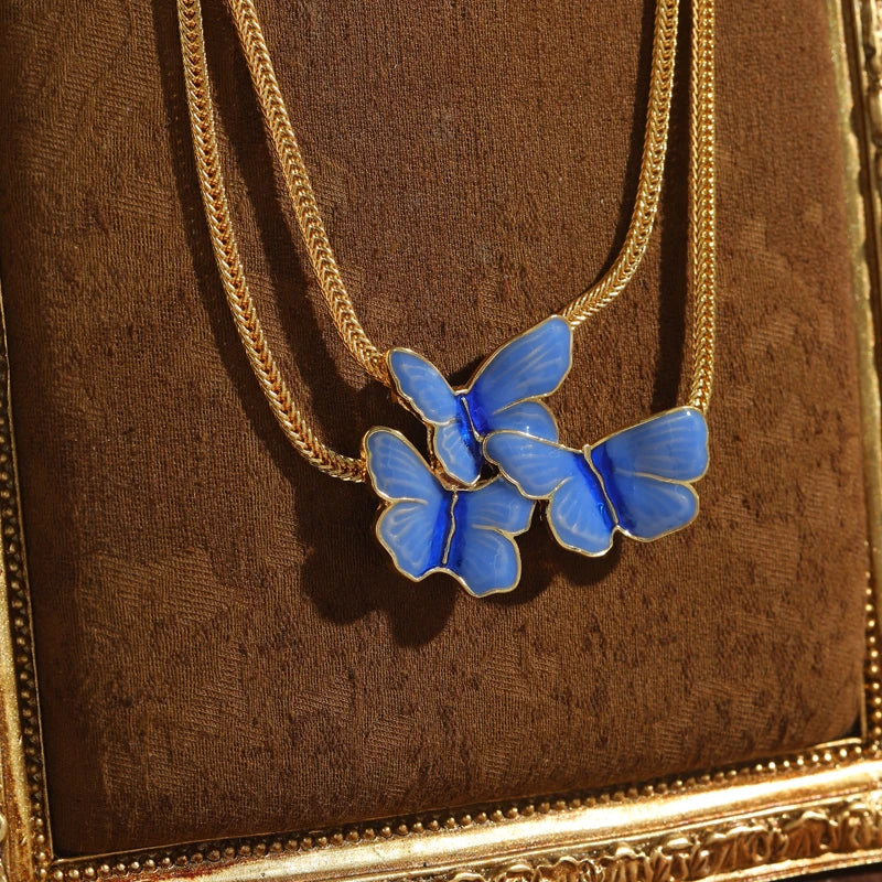 Boho Blue Enamel Butterfly Necklace – Layered Gold Pendant