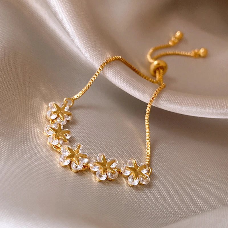 Gold Rhinestone Star & Flower Charm Bracelet – Adjustable Bangle