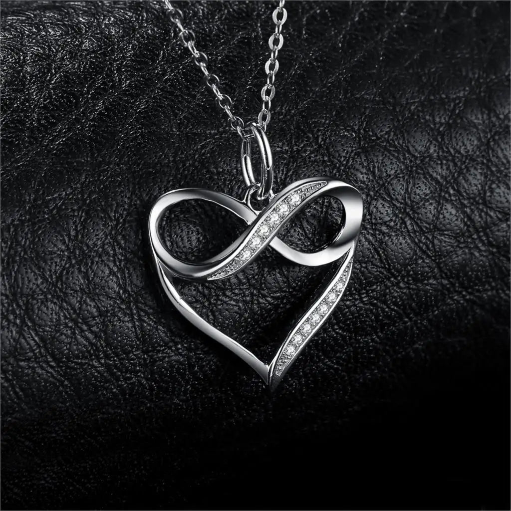 Sterling Silver Infinity Heart Knot Pendant with Simulated Diamonds
