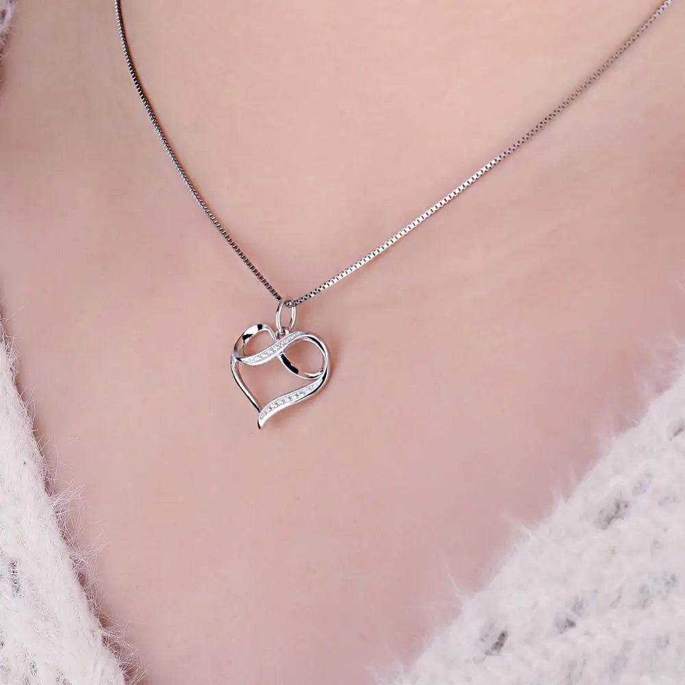 Sterling Silver Infinity Heart Knot Pendant with Simulated Diamonds