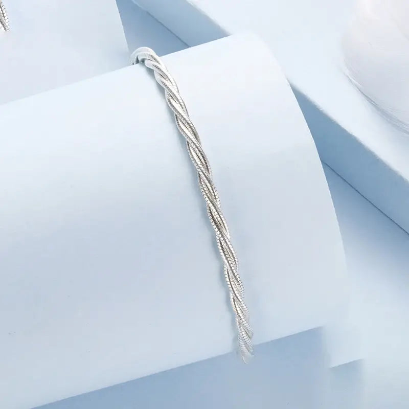 Sterling Silver Twisted Double-Layer Bracelet with Glossy Ball Charm