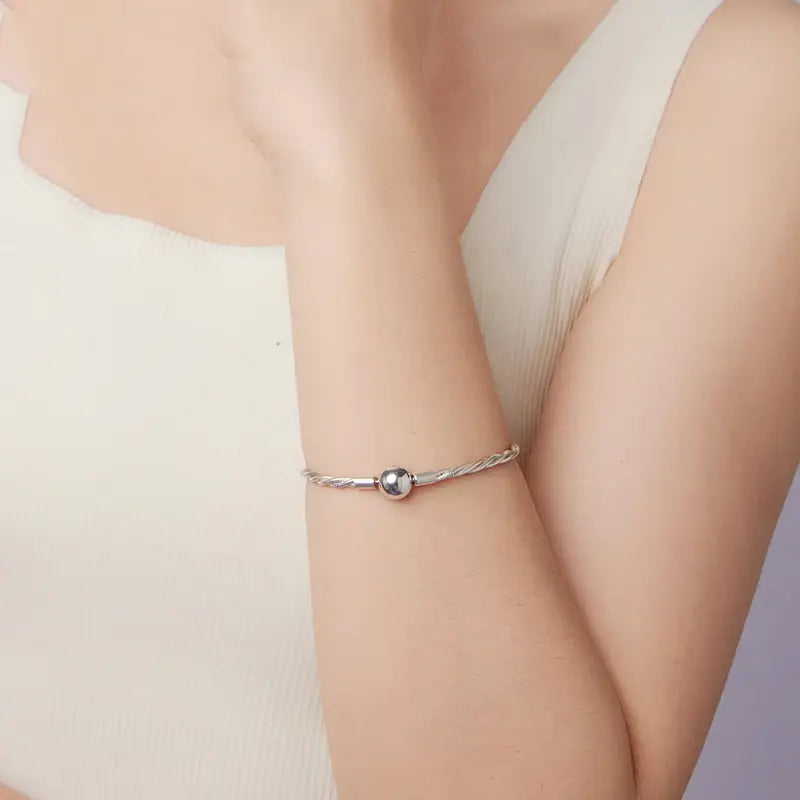 Sterling Silver Twisted Double-Layer Bracelet with Glossy Ball Charm